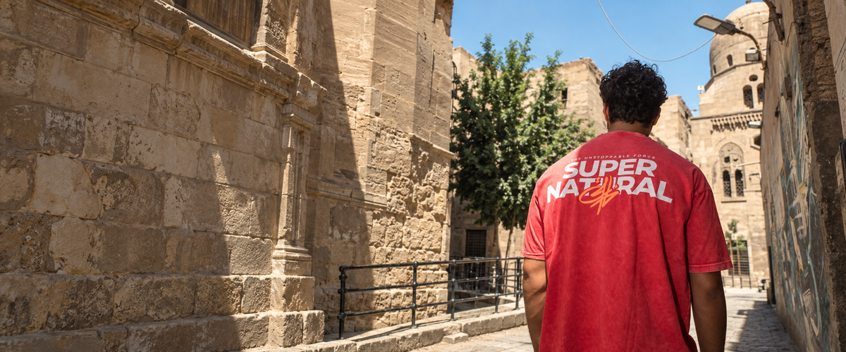 Stabraq red Super Natural graphic tee in a wide Cairo street campaign