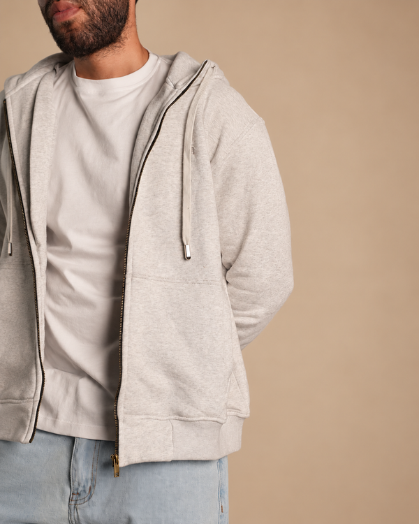 Stabraq High Neck Melton Zipper in heather gray, close-up of the chest and hood on a beige studio background