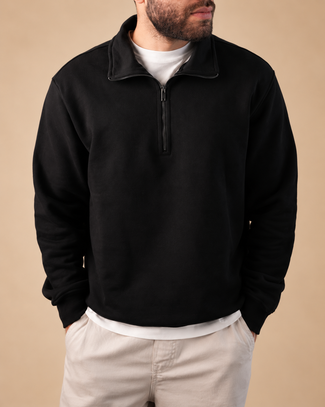 Stabraq Black Quarter Zipper, upper-body view cropped to the lower face on a beige studio background
