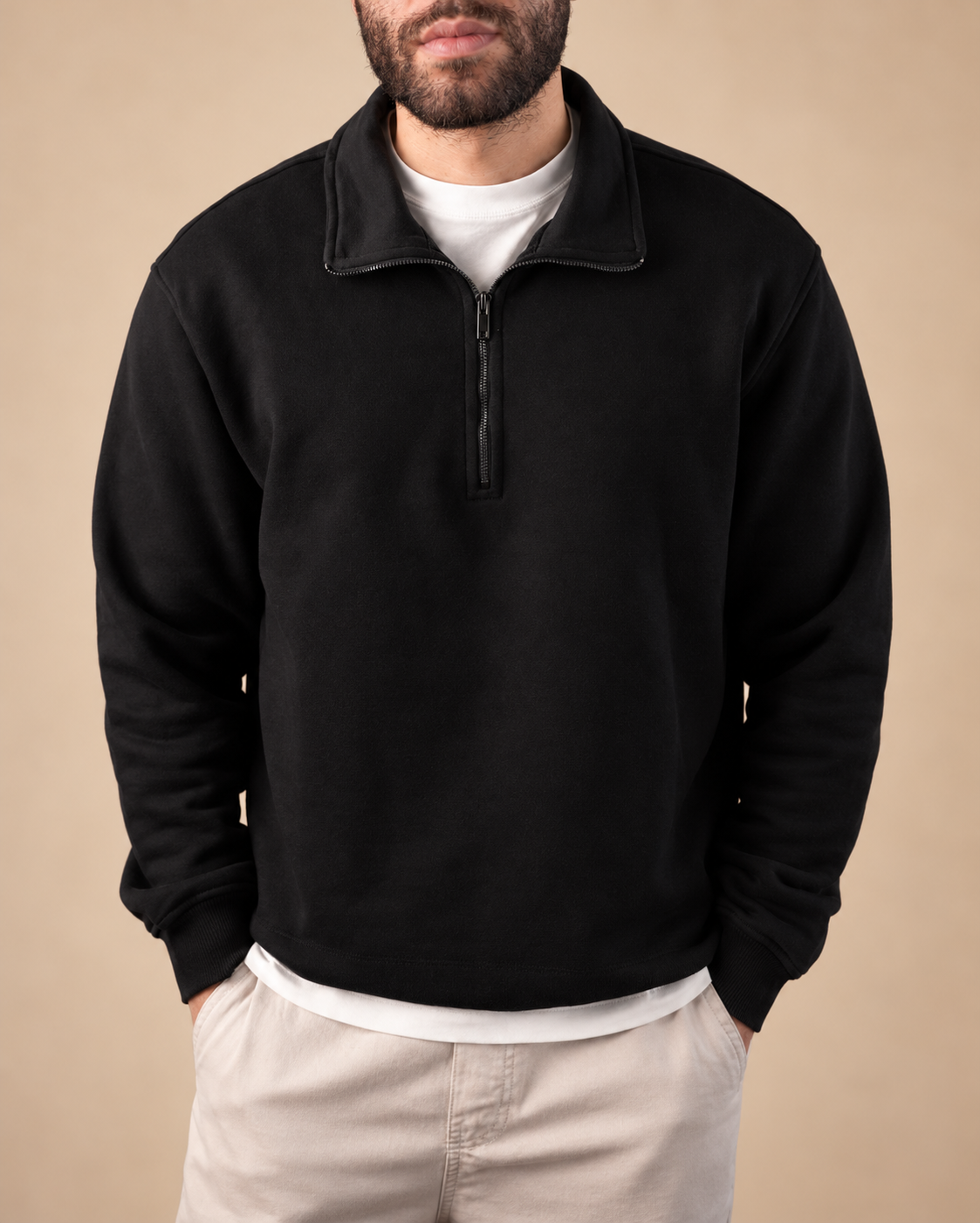 Stabraq Black Quarter Zipper, upper-body view cropped to the lower face on a beige studio background