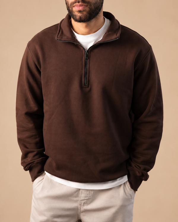Stabraq Brown Quarter Zipper, upper-body view cropped to the lower face on a beige studio background