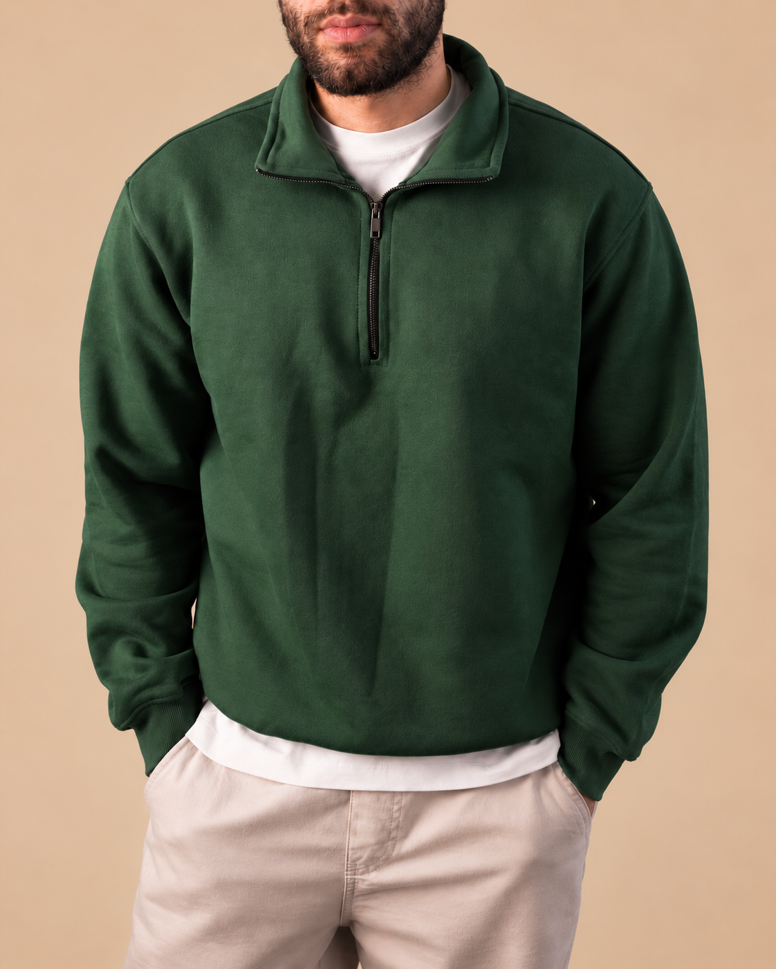 Stabraq Green Quarter Zipper, upper-body view cropped to the lower face on a beige studio background