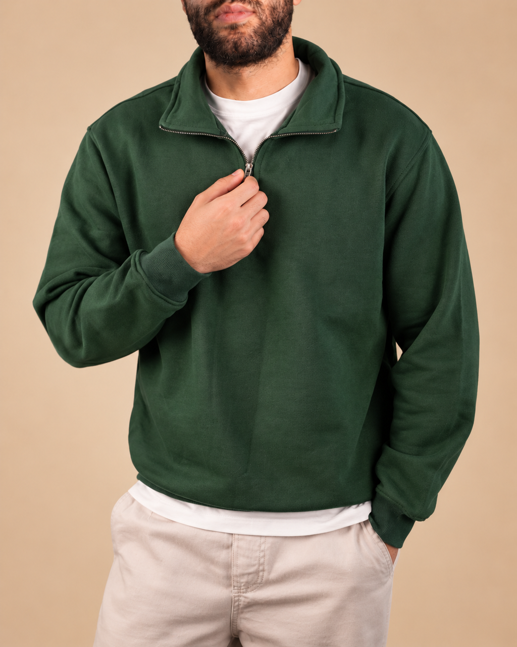 Stabraq Green Quarter Zipper, upper-body view cropped to the lower face on a beige studio background