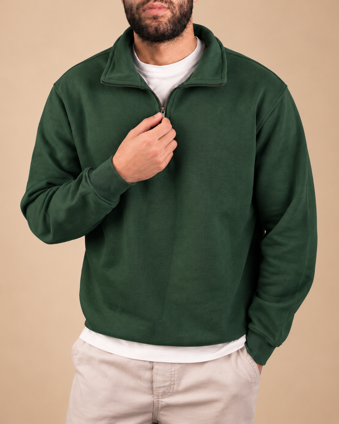 Stabraq Green Quarter Zipper, upper-body view cropped to the lower face on a beige studio background