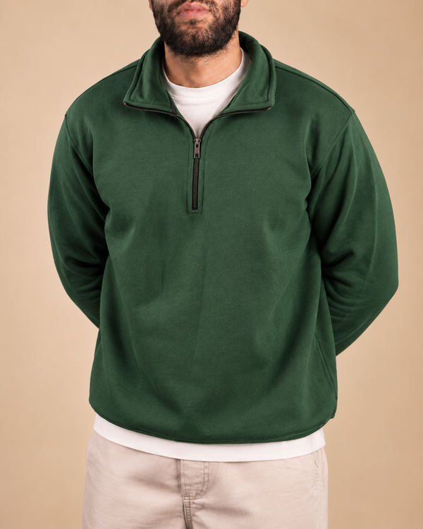 Stabraq Green Quarter Zipper, upper-body view cropped to the lower face on a beige studio background