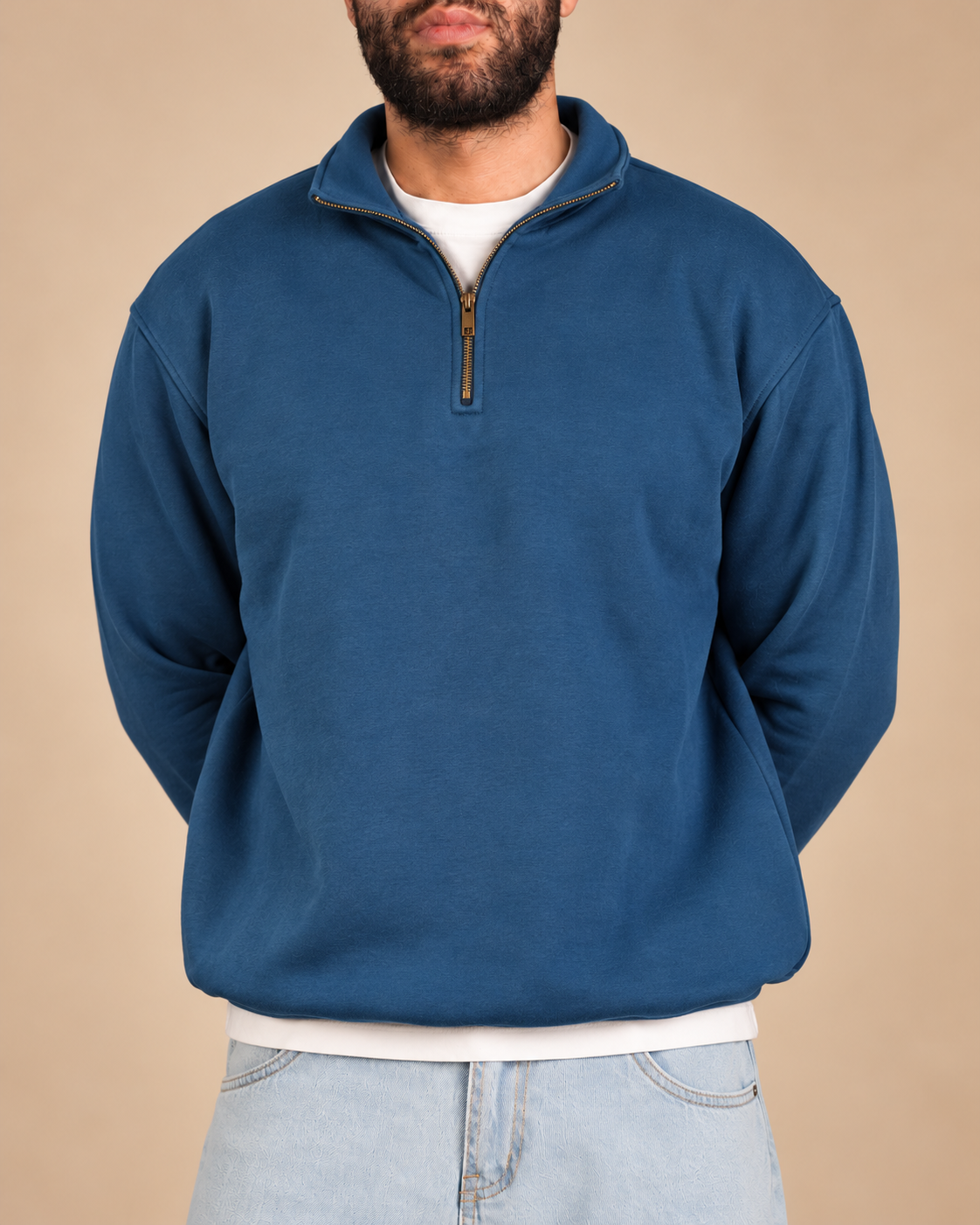 Stabraq Indigo Quarter Zipper, upper-body view cropped to the lower face on a beige studio background