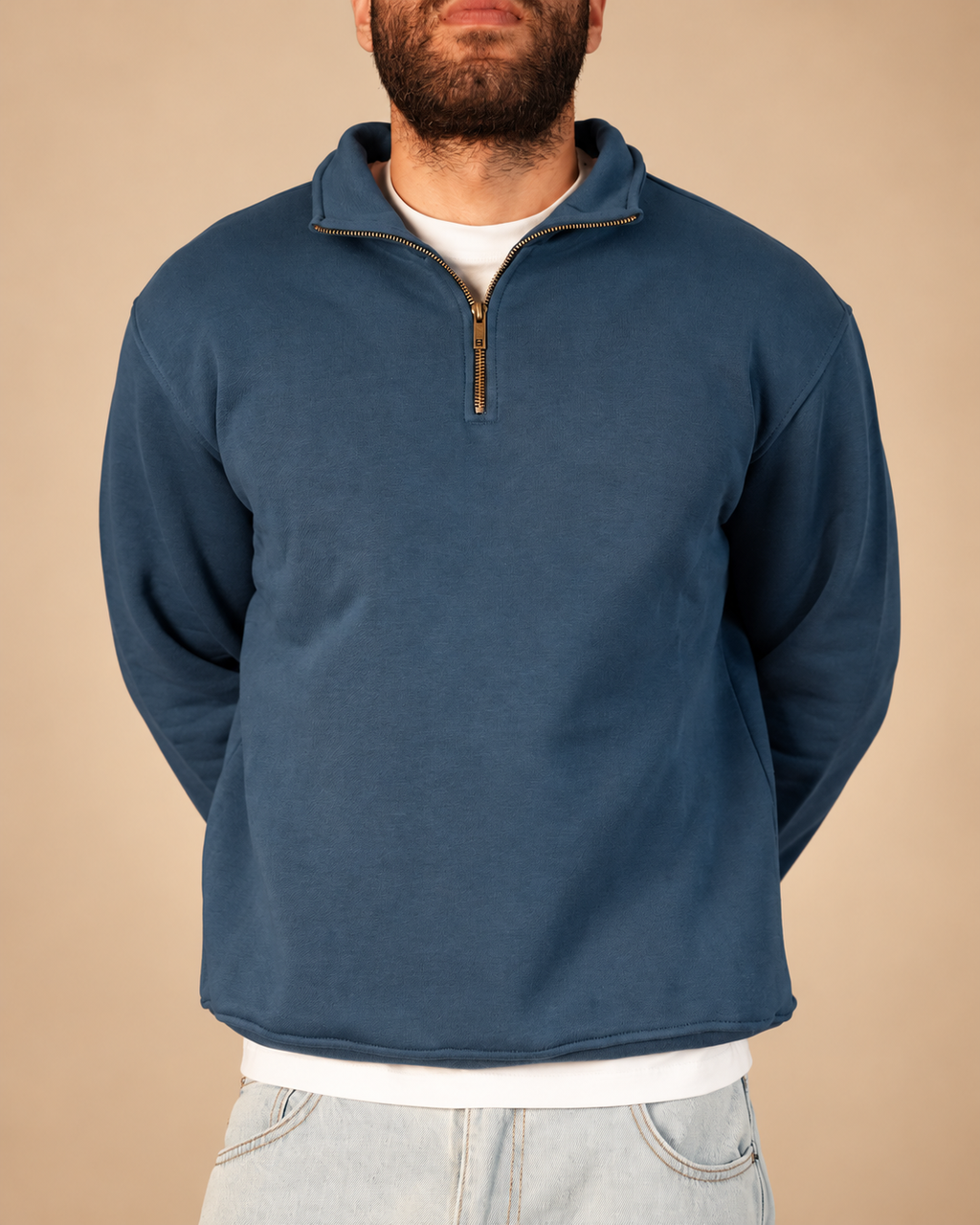 Stabraq Indigo Quarter Zipper, upper-body view cropped to the lower face on a beige studio background