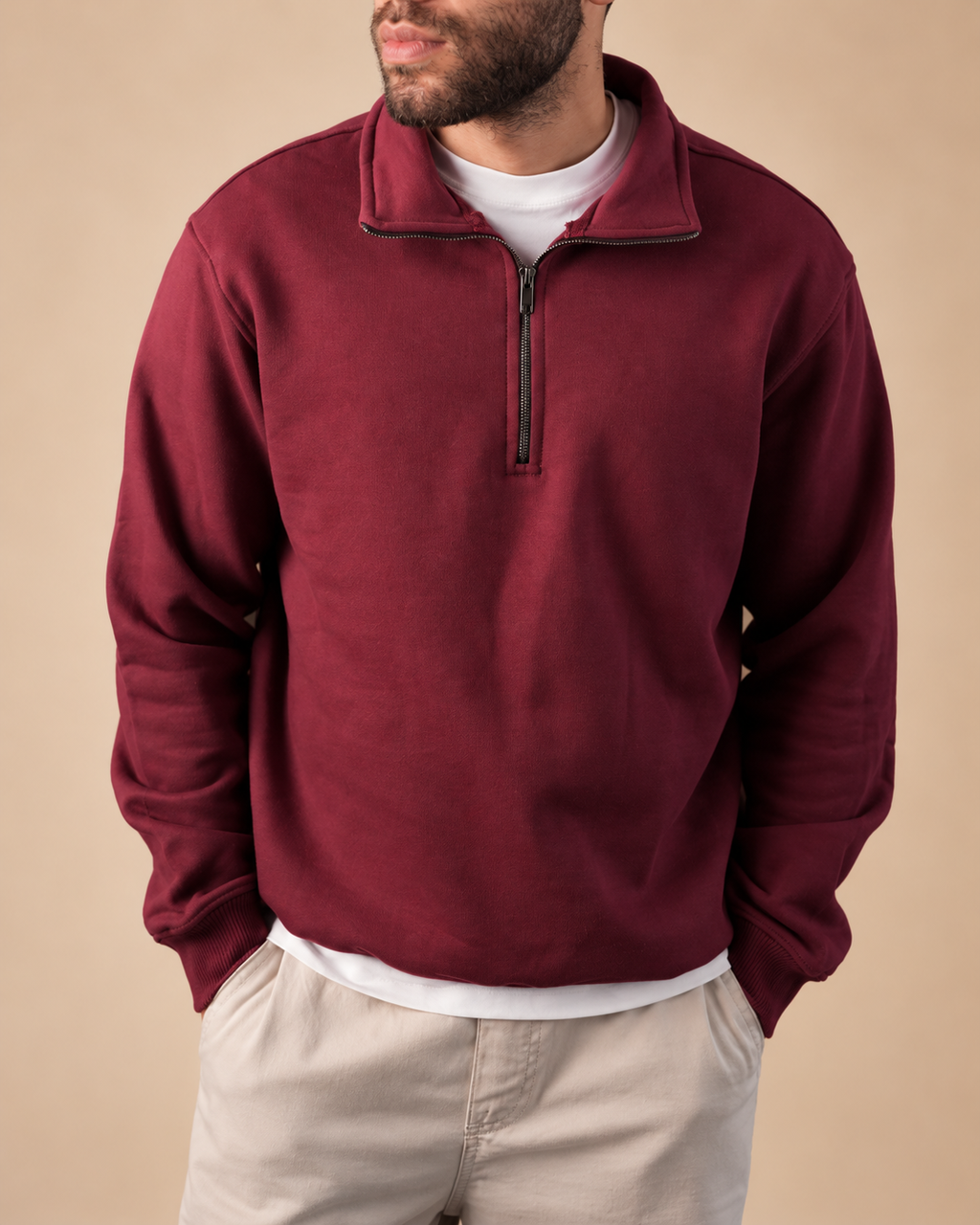 Stabraq Maroon Quarter Zipper, upper-body view cropped to the lower face on a beige studio background