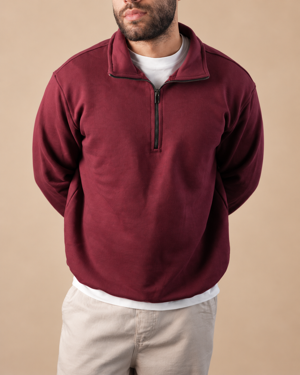 Stabraq Maroon Quarter Zipper, upper-body view cropped to the lower face on a beige studio background