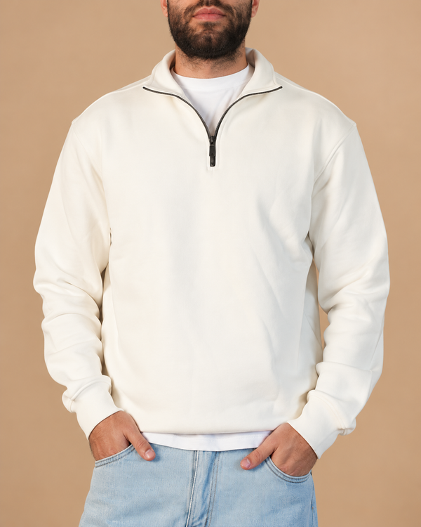 Stabraq Off White Quarter Zipper, upper-body view cropped to the lower face on a beige studio background