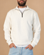 Stabraq Off White Quarter Zipper, upper-body view cropped to the lower face on a beige studio background