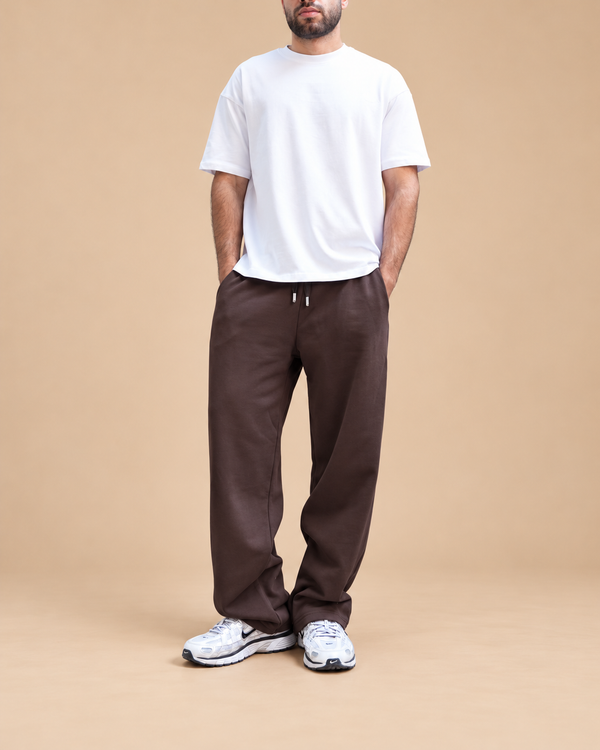 Wide-Leg Sweatpants Brown - full outfit with lower-face crop in beige studio