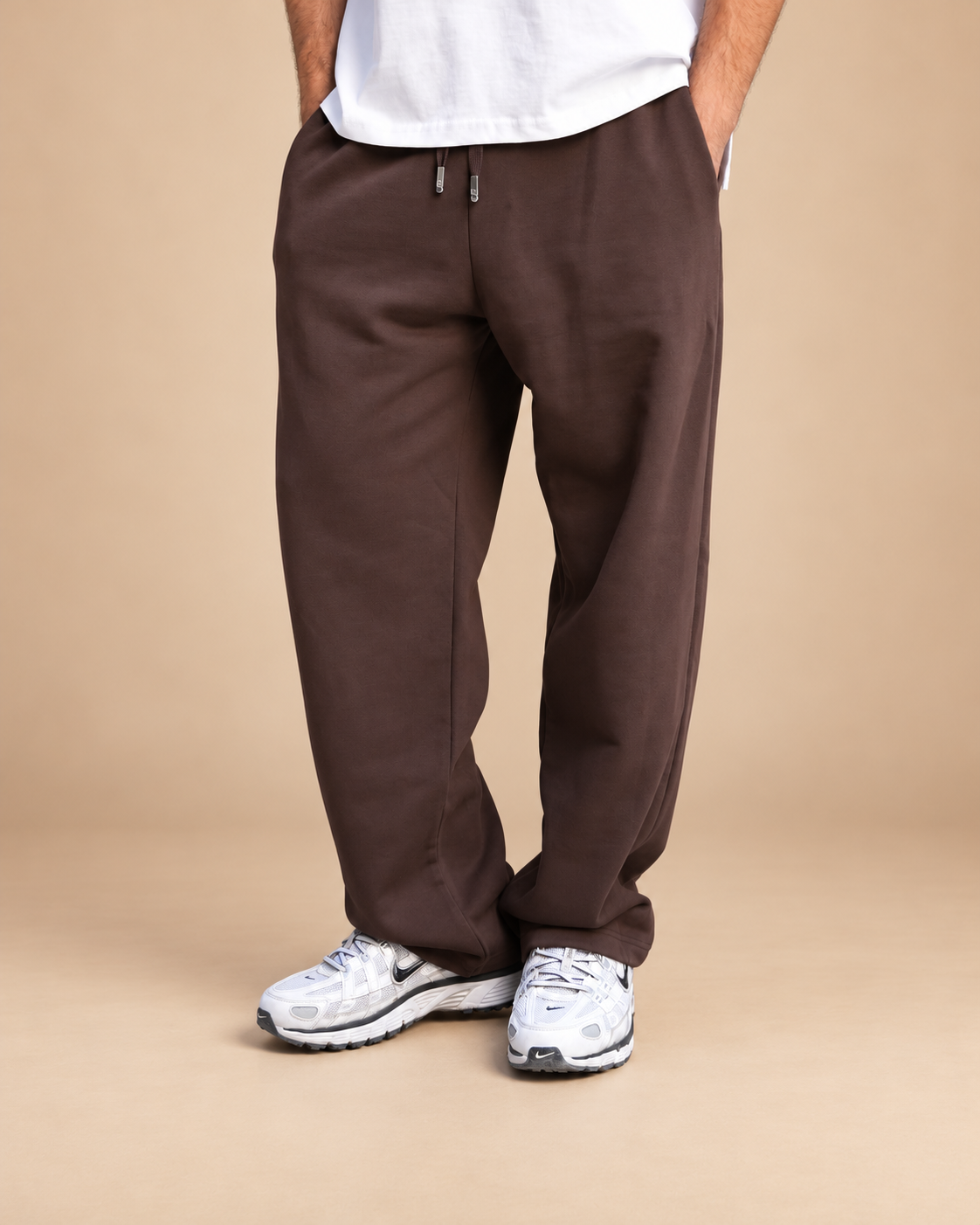 Wide-Leg Sweatpants Brown - lower-body angled view in beige studio