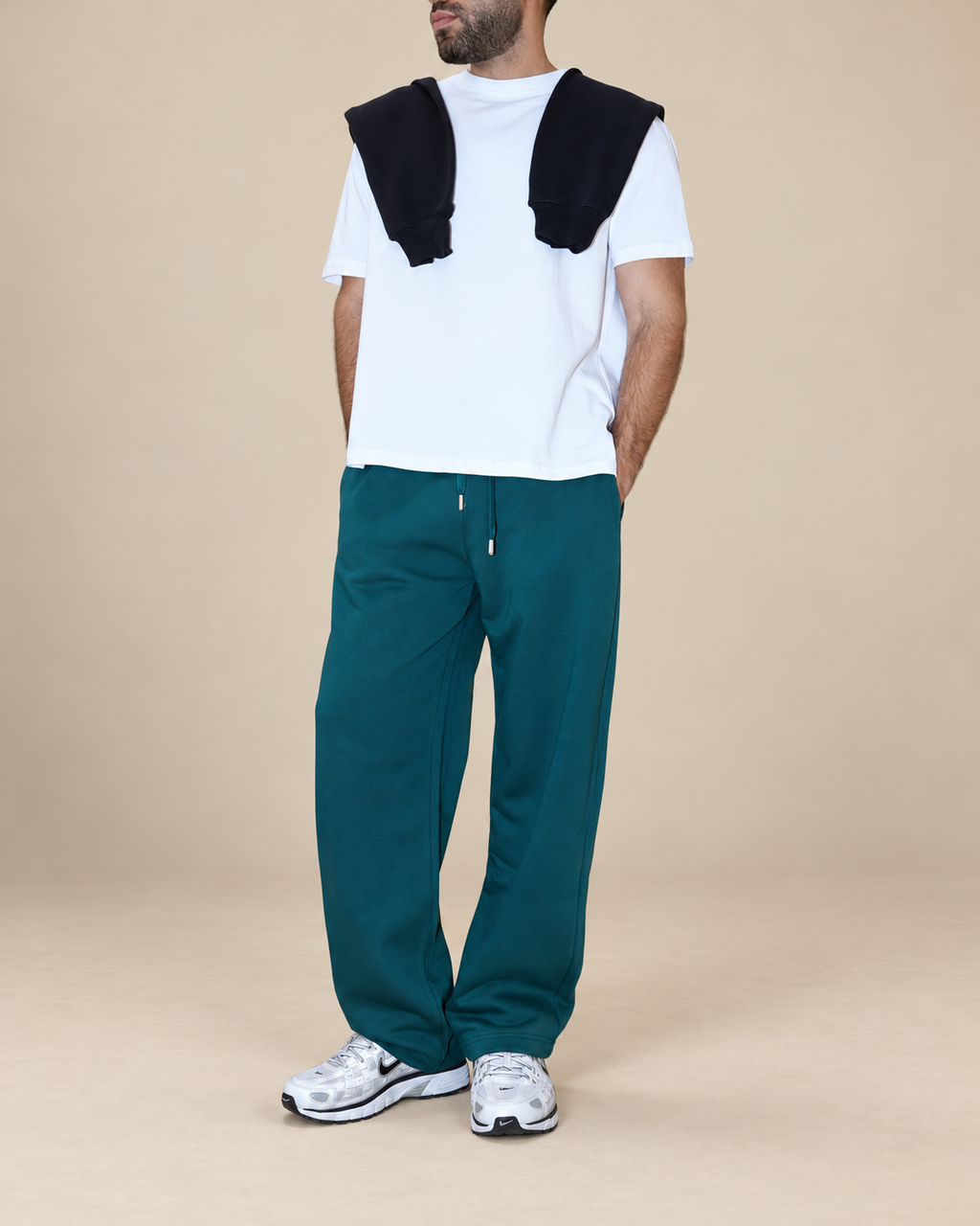 Wide-Leg Sweatpants Deep Teal - full outfit with lower-face crop in beige studio